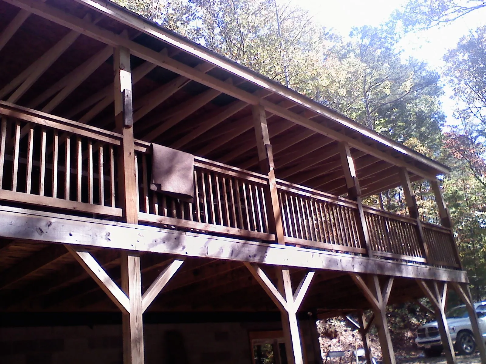 Timber framing under a new elevated porch and deck — Roof Leak Repair in Deland by Roofing Brothers